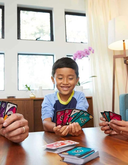 Load image into Gallery viewer, UNO FLIP! Card Game in Storage &amp; Travel Tin, Color Blind Accessible Deck for Kids, Adults &amp; Family Nights &amp; Parties (Amazon Exclusive)
